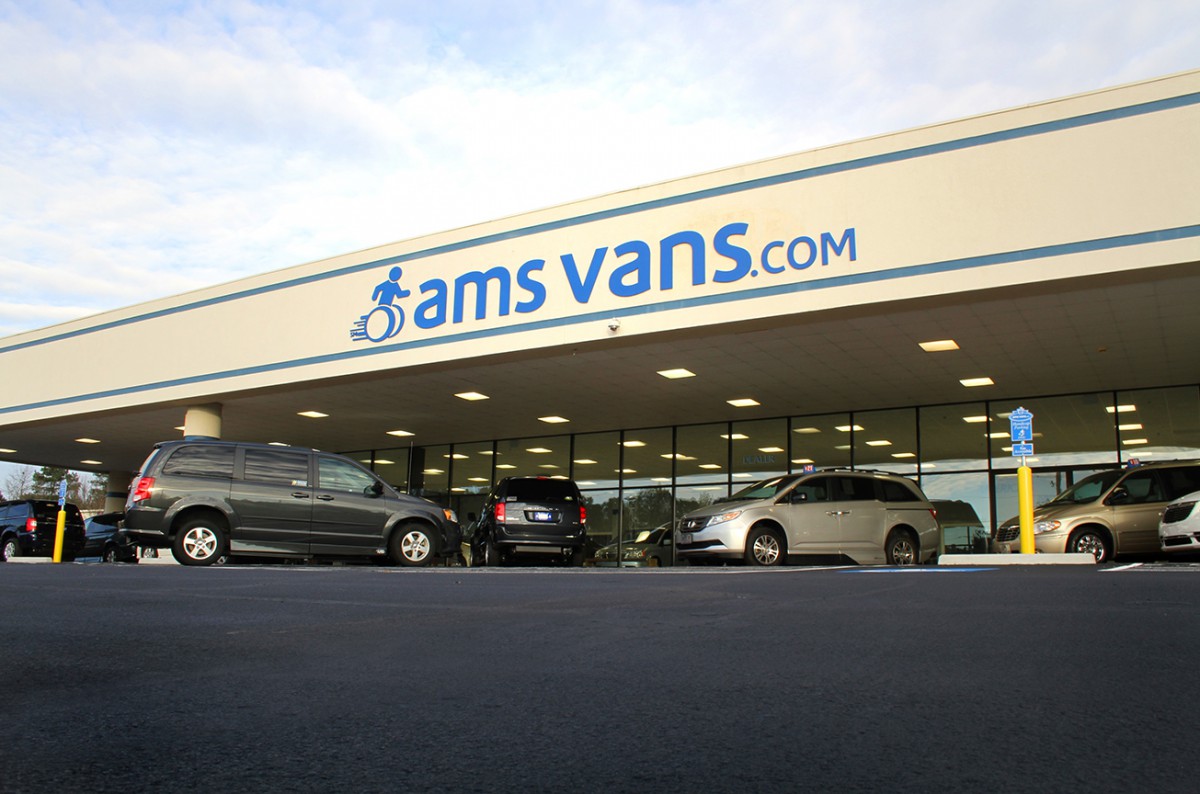 Wheelchair vans parked in front of AMS Vans headquarters in Georgia
