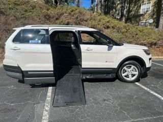 Used Wheelchair Van For Sale: 2018 Ford Explorer Limited Wheelchair Accessible Van For Sale with a BraunAbility - BraunAbility Chevy Traverse - Wheelchair SUV on it. VIN: 1FM5K7D80JG05390