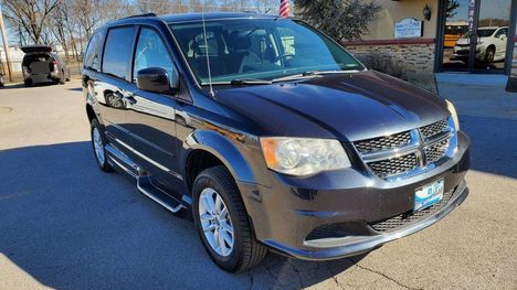 Used Wheelchair Van For Sale: 2014 Dodge Grand Caravan SXT Wheelchair Accessible Van For Sale with a  on it. VIN: 2C4RDGCG8ER128710