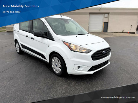 Used Wheelchair Van For Sale: 2022 Ford Transit Connect XLT 4dr LWB Cargo Mini Van w/Rear Liftga Wheelchair Accessible Van For Sale with a  on it. VIN: NM0LE7T25N1542567