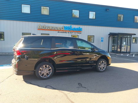 New Wheelchair Van For Sale: 2026 Honda Odyssey Touring Wheelchair Accessible Van For Sale with a BraunAbility Honda Power Infloor on it. VIN: 5FNRL6H88TB017517
