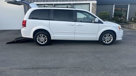 Used Wheelchair Van For Sale: 2016 Dodge Grand Caravan SXT Wheelchair Accessible Van For Sale with a AutoAbility Wheelchair Van Conversions Rear Entry Dodge on it. VIN: 2C4RDGCG7GR338962
