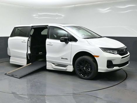 New Wheelchair Van For Sale: 2026 Honda Odyssey Sport-L Wheelchair Accessible Van For Sale with a BraunAbility Honda Power Infloor on it. VIN: 5FNRL6H78TB075330