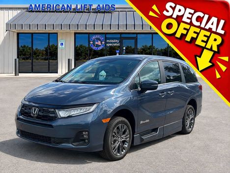 New Wheelchair Van For Sale: 2026 Honda Odyssey Touring Wheelchair Accessible Van For Sale with a BraunAbility Honda Power Infloor on it. VIN: 5FNRL6H85TB054931