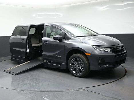 New Wheelchair Van For Sale: 2026 Honda Odyssey Touring Wheelchair Accessible Van For Sale with a BraunAbility Honda Power Infloor on it. VIN: 5FNRL6H87TB046149