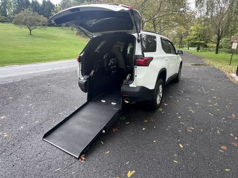 Used Wheelchair Van For Sale: 2023 Chevrolet Traverse 1LT Wheelchair Accessible Van For Sale with a ATS Mobility on it. VIN: 1GNERGKW7PJ252443
