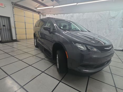 Used Wheelchair Van For Sale: 2021 Chrysler Voyager LX Wheelchair Accessible Van For Sale with a Braun Entervan XT Manual Folding Ramp on it. VIN: 2C4RC1CG1MR591335