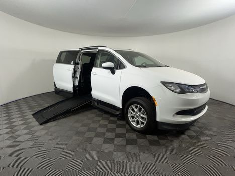 Used Wheelchair Van For Sale: 2021 Chrysler Voyager LXi Wheelchair Accessible Van For Sale with a Braun Entervan XT Manual Folding Ramp on it. VIN: 2C4RC1DG2MR602163