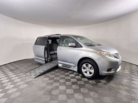 Used Wheelchair Van For Sale: 2015 Toyota Sienna LE Wheelchair Accessible Van For Sale with a Braun Entervan XT Folding Ramp on it. VIN: 5TDKK3DC7FS563352