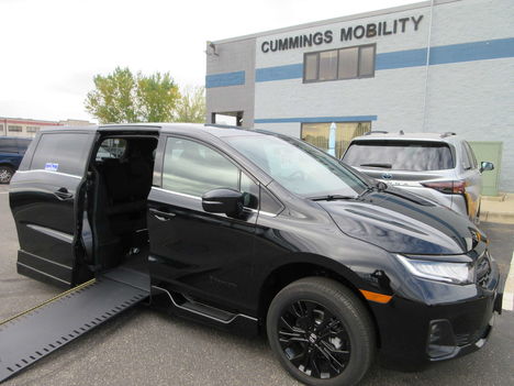 New Wheelchair Van For Sale: 2026 Honda Odyssey Sport-L Wheelchair Accessible Van For Sale with a BraunAbility Honda Power Infloor on it. VIN: 5FNRL6H75TB045668