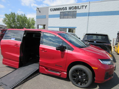 New Wheelchair Van For Sale: 2025 Honda Odyssey Sport-L Wheelchair Accessible Van For Sale with a BraunAbility Honda Power Infloor on it. VIN: 5FNRL6H7XSB080396