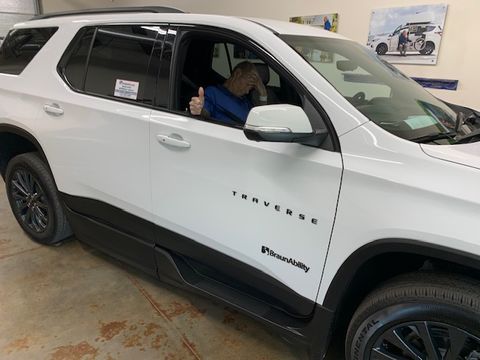 Used Wheelchair Van For Sale: 2023 Chevrolet Traverse RS Wheelchair Accessible Van For Sale with a BraunAbility - Chevrolet Traverse - Wheelchair SUV on it. VIN: IGNERJKW7PJ176834