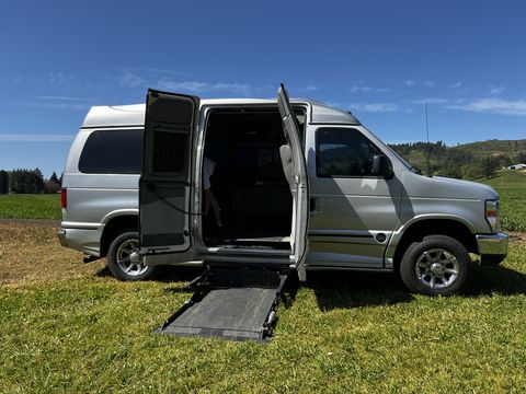 Used Wheelchair Van For Sale: 2009 Ford E-150 Tuscany Wheelchair Accessible Van For Sale with a VMI - Full Size Wheelchair Vans on it. VIN: 1FTNE14LX9DA78650