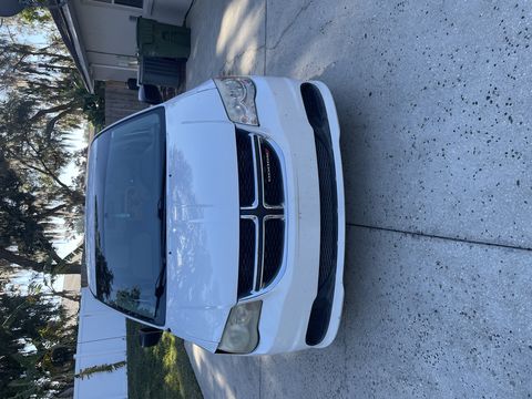 Used Wheelchair Van For Sale: 2015 Dodge Caravan SE Plus Wheelchair Accessible Van For Sale with a BraunAbility - Dodge Manual Rear Entry on it. VIN: 2C7WDGBG1FR686052