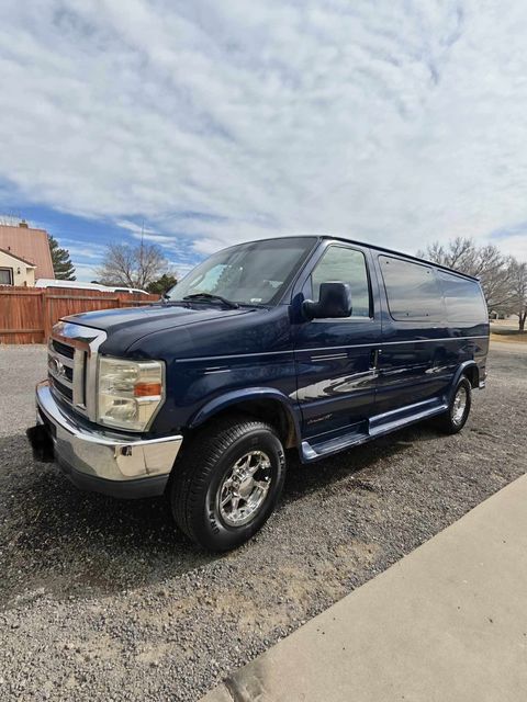 Used Wheelchair Van For Sale: 2010 Ford Econoline E-150 Wheelchair Accessible Van For Sale with a Rollx Vans - Rollx Full Size Ford on it. VIN: 1FDNE1EL2ADA09689
