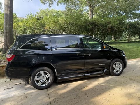 Used Wheelchair Van For Sale: 2011 Honda Odyssey Touring Wheelchair Accessible Van For Sale with a BraunAbility - Honda Entervan II on it. VIN: 5FNRL5H98BB0900095