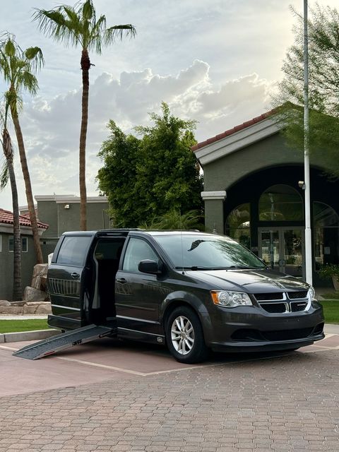 Used Wheelchair Van For Sale: 2015 Dodge Caravan SXT Wheelchair Accessible Van For Sale with a Americas Mobility Superstore - AMS - Ford Transit Side-Entry on it. VIN: 2C4RDGCG2FR732707