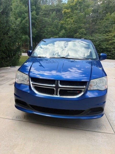 Used Wheelchair Van For Sale: 2013 Dodge Caravan SXT Wheelchair Accessible Van For Sale with a BraunAbility - Dodge Entervan Xi Infloor on it. VIN: 2C4RDGCG5DR661550