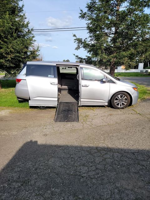 Used Wheelchair Van For Sale: 2014 Honda Odyssey  Wheelchair Accessible Van For Sale with a  on it. VIN: 5FNRL5H90EB061453