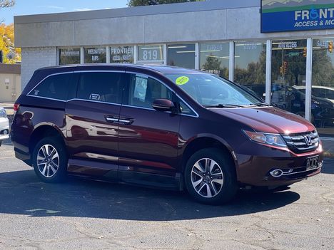 Used Wheelchair Van For Sale: 2015 Honda Odyssey  Wheelchair Accessible Van For Sale with a VMI In-Floor on it. VIN: 5FNRL5H90FB092879