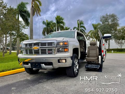 Used Wheelchair Van For Sale: 2015 Chevrolet Silverado Z71 LTZ Wheelchair Accessible Van For Sale with a Mobility SVM - Wheelchair truck conversion on it. VIN: 3GCUKSEJ9FG302674