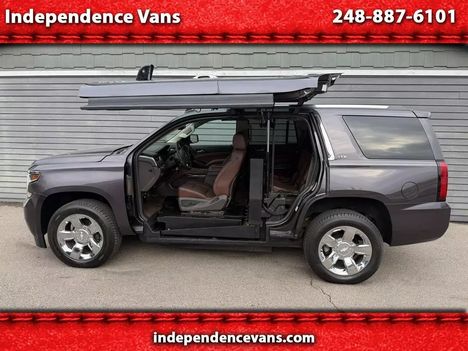 Used Wheelchair Van For Sale: 2015 Chevrolet Tahoe 4WD 4dr LTZ Wheelchair Accessible Van For Sale with a  on it. VIN: 1GNSKCKC2FR114377