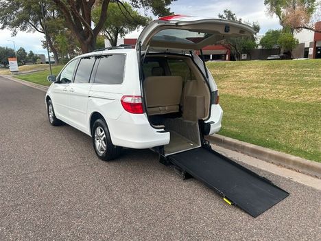 Used Wheelchair Van For Sale: 2005 Honda Odyssey EX-L Wheelchair Accessible Van For Sale with a Power Rear Entry Ramp on it. VIN: 5FNRL38605B422819
