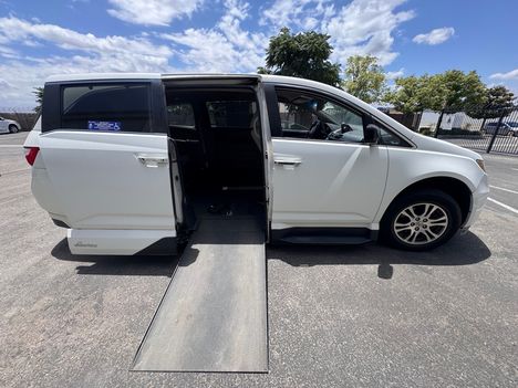 Used Wheelchair Van For Sale: 2012 Honda Odyssey EX Wheelchair Accessible Van For Sale with a Vantage Mobility VMI Northstar on it. VIN: 5FNRL5H42CB131388