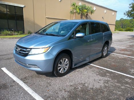 Used Wheelchair Van For Sale: 2014 Honda Odyssey EX Wheelchair Accessible Van For Sale with a Vantage Mobility VMI Northstar on it. VIN: 5FNRL5H42EB031777