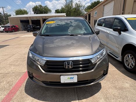 Used Wheelchair Van For Sale: 2022 Honda Odyssey Touring Wheelchair Accessible Van For Sale with a BraunAbility Braun XI on it. VIN: 5FNRL6H87NB027121