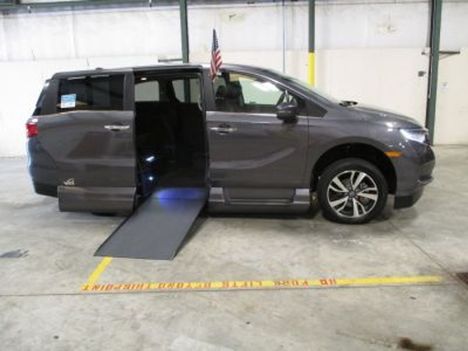 Used Wheelchair Van For Sale: 2021 Honda Odyssey Touring Wheelchair Accessible Van For Sale with a Vantage Mobility VMI Northstar on it. VIN: 5FNRL6H88MB036537