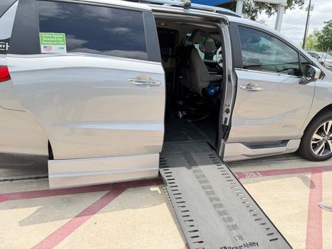 Used Wheelchair Van For Sale: 2022 Honda Odyssey Touring Wheelchair Accessible Van For Sale with a BraunAbility Braun XI on it. VIN: 5FNRL6H8XNB053678