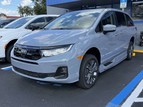 New Wheelchair Van For Sale: 2026 Honda Odyssey Touring Wheelchair Accessible Van For Sale with a BraunAbility Honda Power Infloor on it. VIN: 045798