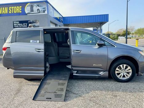 Used Wheelchair Van For Sale: 2016 Honda Odyssey EX-L Wheelchair Accessible Van For Sale with a BraunAbility Honda Entervan II on it. VIN: 5FNRL5H64GB129830