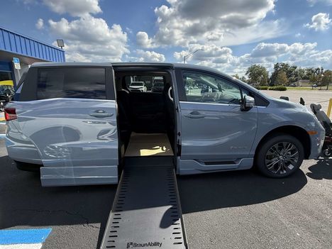 New Wheelchair Van For Sale: 2026 Honda Odyssey Touring Wheelchair Accessible Van For Sale with a BraunAbility Chrysler Foldout XT on it. VIN: 5FNRL6H86TB045798