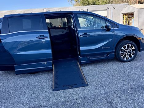 New Wheelchair Van For Sale: 2026 Honda Odyssey Elite Wheelchair Accessible Van For Sale with a BraunAbility Honda Power Infloor on it. VIN: 5FNRL6H94TB009780