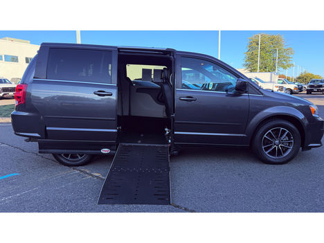 Used Wheelchair Van For Sale: 2017 Dodge Grand Caravan SXT - Adaptive Powered Side Ramp Wheelchair Accessible Van For Sale with a  on it. VIN: 2C4RDGCG7HR791691