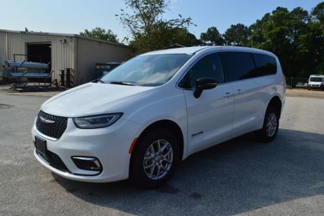 Used Wheelchair Van For Sale: 2025 Chrysler Pacifica New BraunAbility V7 Rear Entry Conversio Wheelchair Accessible Van For Sale with a  on it. VIN: 2C4RC1BG0SR551228