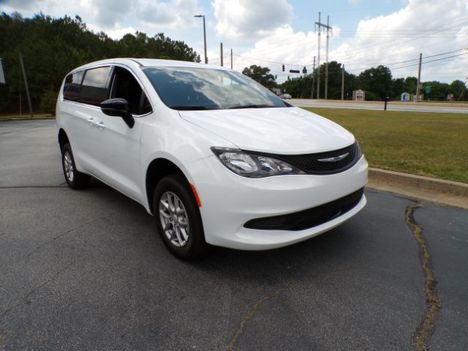 New Wheelchair Van For Sale: 2026 Chrysler Voyager New Wheelchair Conversion Rear Entry Wheelchair Accessible Van For Sale with a  on it. VIN: 2C4RC1CG0TR264620