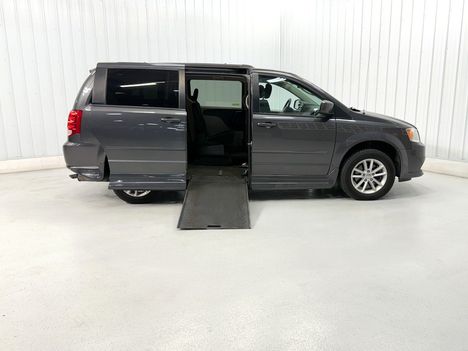 Used Wheelchair Van For Sale: 2016 Dodge Grand Caravan SXT Wheelchair Accessible Van For Sale with a Rollx 11 Inch Drop Floor Conversion with In-the-floor Ramp on it. VIN: 01693A