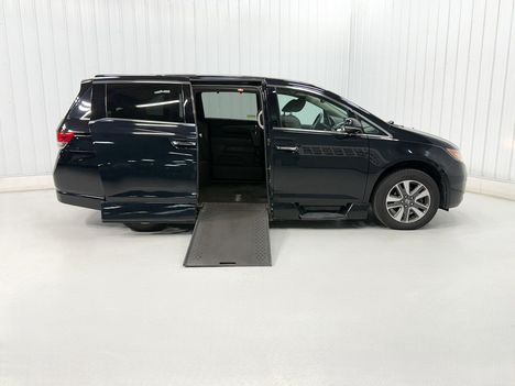 Used Wheelchair Van For Sale: 2014 Honda Odyssey TOURING EL Wheelchair Accessible Van For Sale with a Rollx 11 Inch Drop Floor Conversion with In-the-floor Ramp on it. VIN: 401798B