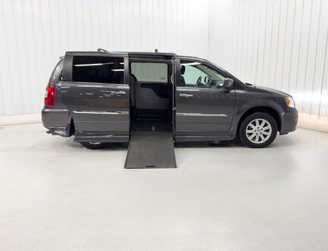 Used Wheelchair Van For Sale: 2016 Chrysler Town & Country TOURING-K Wheelchair Accessible Van For Sale with a Rollx 11 Inch Drop Floor Conversion with In-the-floor Ramp on it. VIN: 401976A