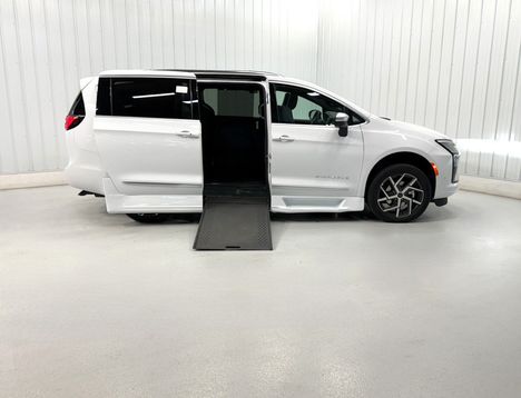 New Wheelchair Van For Sale: 2027 Chrysler Pacifica PINNACLE Wheelchair Accessible Van For Sale with a Rollx 12.5 Inch Drop Floor Conversion with In-the-floor Ramp on it. VIN: 402002