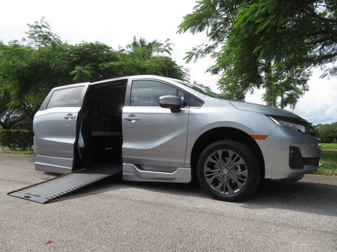 New Wheelchair Van For Sale: 2026 Honda Odyssey Touring Wheelchair Accessible Van For Sale with a BraunAbility - Honda Power Infloor on it. VIN: 5FNRL6H80TB048843