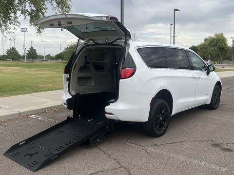 Used Wheelchair Van For Sale: 2024 Chrysler Voyager LX Wheelchair Accessible Van For Sale with a VanAbility - Chrysler Voyager Rear-Entry on it. VIN: 2C4RC1CG2RR18714