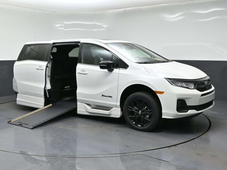 New Wheelchair Van For Sale: 2026 Honda Odyssey Sport-L Wheelchair Accessible Van For Sale with a BraunAbility Honda Power Infloor on it. VIN: 5FNRL6H74TB071064
