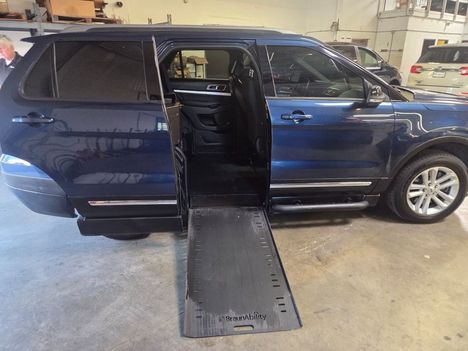 Used Wheelchair Van For Sale: 2017 Ford Explorer XLT Wheelchair Accessible Van For Sale with a BraunAbility XI on it. VIN: 1FM5K7D85HGA89720