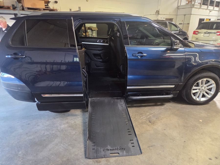 Used Wheelchair Van For Sale: 2017 Ford Explorer XLT Wheelchair Accessible Van For Sale with a BraunAbility XI on it. VIN: 1FM5K7D85HGA89720