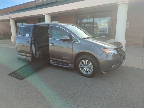 Used Wheelchair Van For Sale: 2016 Honda Odyssey EX-L Wheelchair Accessible Van For Sale with a BraunAbility Entervan II on it. VIN: 5FNRL5H62GB129826