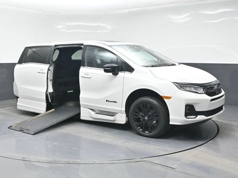 New Wheelchair Van For Sale: 2026 Honda Odyssey Sport Wheelchair Accessible Van For Sale with a BraunAbility XI on it. VIN: 5FNRL6H73TB076918